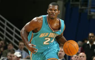CLEVELAND - FEBRUARY 23:  Jamal Mashburn #24 of the New Orleans Hornets brings the ball down court against the Cleveland Cavaliers on February 23, 2004 at Gund Arena in Cleveland, Ohio.  NOTE TO USER: User expressly acknowledges and agrees that, by downloading and or using this photograph, User is consenting to the terms and conditions of the Getty Images License Agreement.  (Photo by David Liam Kyle/NBAE via Getty Images)