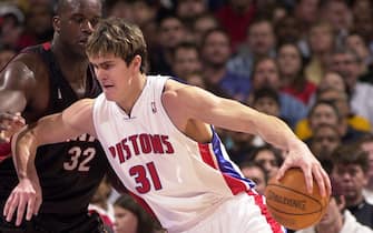 AUBURN HILLS, MI - NOVEMBER 26:  Darko Milicic #31 of the Detroit Pistons drives against Shaquille O'Neal #32 of the Miami Heat on November 26, 2004 at the Palace of Auburn Hills, in Auburn Hills, Michigan.  NOTE TO USER: User expressly acknowledges and agrees that, by downloading and or using this photograph, User is consenting to the terms and conditions of the Getty Images License Agreement. Mandatory Copyright Notice: Copyright 2004 NBAE  (Photo by D.Lippitt/Einstein/NBAE via Getty Images)