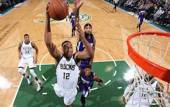 Milwaukee, WI - NOVEMBER 25: Jabari Parker #12 of the Milwaukee Bucks shoots the ball against the Sacramento Kings on November 25, 2015 at the BMO Harris Bradley Center in Milwaukee, Wisconsin. NOTE TO USER: User expressly acknowledges and agrees that, by downloading and or using this Photograph, user is consenting to the terms and conditions of the Getty Images License Agreement. Mandatory Copyright Notice: Copyright 2015 NBAE (Photo by Gary Dineen/NBAE via Getty Images)