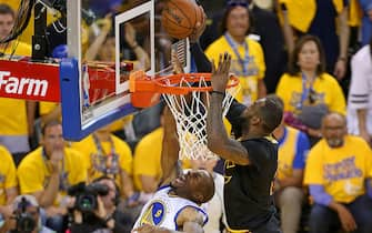 OAKLAND, CA - JUNE 19:  LeBron James #23 of the Cleveland Cavaliers blocks a shot against Andre Iguodala #9 of the Golden State Warriors during Game Seven of the 2016 NBA Finals on June 19, 2016 at ORALCE Arena in Oakland, California. NOTE TO USER: User expressly acknowledges and agrees that, by downloading and or using this Photograph, user is consenting to the terms and conditions of the Getty Images License Agreement. Mandatory Copyright Notice: Copyright 2016 NBAE (Photo by Joe Murphy /NBAE via Getty Images)