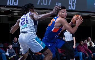 WHITE PLAINS, NY - FEBRUARY 26: Ivan Rabb #25 of the Westchester Knicks take ball against Tai Odiase #21 of the Greensboro Swarm during an NBA G-League game on February 26, 2020 at Westchester County Center in White Plains, New York. NOTE TO USER: User expressly acknowledges and agrees that, by downloading and or using this photograph, User is consenting to the terms and conditions of the Getty Images License Agreement. Mandatory Copyright Notice: Copyright 2020 NBAE (Photo by Michelle Farsi/NBAE via Getty Images)