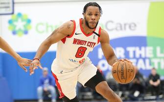 WILMINGTON, DE - FEBRUARY 29: Jaron Blossomgame #8 of the Windy City Bulls drives against Terry Harris #1 of the Delaware Blue Coats during a game at the 76ers Fieldhouse on February 29, 2020 in Wilmington, DE. NOTE TO USER: User expressly acknowledges and agrees that, by downloading and or using this photograph, User is consenting to the terms and conditions of the Getty Images License Agreement. (Photo by Ned Dishman/NBAE via Getty Images)