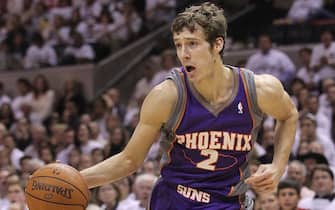 98938164 SAN ANTONIO - MAY 07: Forward Goran Dragic #2 of the Phoenix Suns dribbles the ball against the San Antonio Spurs in Game Three of the Western Conference Semifinals during the 2010 NBA Playoffs at AT&T Center on May 7, 2010 in San Antonio, Texas. NOTE TO USER: User expressly acknowledges and agrees that, by downloading and or using this photograph, User is consenting to the terms and conditions of the Getty Images License Agreement. (Photo by Ronald Martinez/Getty Images)