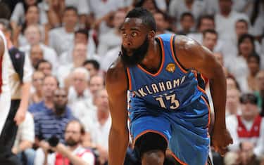 MIAMI, FL - JUNE 19: James Harden #13 of the Oklahoma City Thunder reacts after shooting a three-pointer against LeBron James #6 of the Miami Heat during Game Four of the 2012 NBA Finals at American Airlines Arena on June 19, 2012 in Miami, Florida.NOTE TO USER: User expressly acknowledges and agrees that, by downloading and or using this Photograph, user is consenting to the terms and conditions of the Getty Images License Agreement. Mandatory Copyright Notice: Copyright 2012 NBAE (Photo by Garrett Ellwood/NBAE via Getty Images)