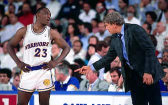 OAKLAND, CA - 1988: Mitch Richmond #23 and Head Coach Don Nelson of the Golden State Warriors during a game circa 1988 at the Oakland-Alameda County Coliseum Arena in Oakland, California. NOTE TO USER: User expressly acknowledges and agrees that, by downloading and/or using this photograph, user is consenting to the terms and conditions of the Getty Images License Agreement. Mandatory Copyright Notice: Copyright 1988 NBAE (Photo by Andrew D. Bernstein/NBAE via Getty Images)