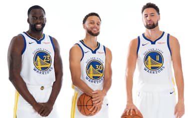 SAN FRANCISCO, CA - SEPTEMBER 30: Stephen Curry #30, Draymond Green #23, Klay Thompson #11, and D'Angelo Russell #0 of the Golden State Warriors pose for a portrait during media day on September 30, 2019 at the Biofreeze Performance Center in San Francisco, California. NOTE TO USER: User expressly acknowledges and agrees that, by downloading and/or using this photograph, user is consenting to the terms and conditions of the Getty Images License Agreement. Mandatory Copyright Notice: Copyright 2019 NBAE (Photo by Noah Graham/NBAE via Getty Images)