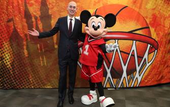 CHARLOTTE, NC - FEBRUARY 15: NBA Commissioner, Adam Silver and Mickey Mouse meet during NBA All Star Weekend in Charlotte, North Carolina on February 15, 2019 at Bojangles Coliseum. The NBA is collaborating with Walt Disney Imagineering on the new NBA Experience opening this summer at Walt Disney World Resort in Florida. This one-of-a-kind destination will bring NBA moments to life through thrilling basketball activities and interactive experiences that will appeal to boys, girls and adults. NOTE TO USER: User expressly acknowledges and agrees that, by downloading and or using this photograph, User is consenting to the terms and conditions of the Getty Images License Agreement. Mandatory Copyright Notice: Copyright 2019 NBAE (Photo by Joe Murphy/NBAE via Getty Images)
