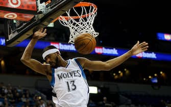 459610034 MINNEAPOLIS, MN - NOVEMBER 21: Corey Brewer #13 of the Minnesota Timberwolves dunks the ball against the San Antonio Spurs during the game on November 21, 2014 at Target Center in Minneapolis, Minnesota. The Spurs defeated the Timberwolves 121-92. NOTE TO USER: User expressly acknowledges and agrees that, by downloading and or using this Photograph, user is consenting to the terms and conditions of the Getty Images License Agreement. (Photo by Hannah Foslien/Getty Images)