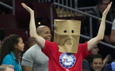 PHILADELPHIA, PA - DECEMBER 22: A Philadelphia 76ers fan looks on with a bag over his head during the game against the Memphis Grizzlies on December 22, 2015 at the Wells Fargo Center in Philadelphia, Pennsylvania. The Grizzles defeated the 76ers 104-90.  NOTE TO USER: User expressly acknowledges and agrees that, by downloading and or using this photograph, User is consenting to the terms and conditions of the Getty Images License Agreement. (Photo by Mitchell Leff/Getty Images) 