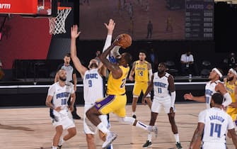 Orlando, FL - JULY 25: LeBron James #23 of the Los Angeles Lakers shoots the ball against the Orlando Magic during a scrimmage on July 25, 2020 at HP Field House at ESPN Wide World of Sports in Orlando, Florida. NOTE TO USER: User expressly acknowledges and agrees that, by downloading and/or using this Photograph, user is consenting to the terms and conditions of the Getty Images License Agreement. Mandatory Copyright Notice: Copyright 2020 NBAE (Photo by Garrett Ellwood/NBAE via Getty Images)