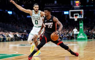 BOSTON, MASSACHUSETTS - DECEMBER 04: Jayson Tatum #0 of the Boston Celtics defends Jimmy Butler #22 of the Miami Heat during the first half of the game between the Boston Celtics and the Miami Heat at TD Garden on December 04, 2019 in Boston, Massachusetts. (Photo by Maddie Meyer/Getty Images)