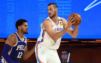1227789141 Orlando, FL - JULY 26: Danilo Gallinari #8 of the Oklahoma City Thunder handles the ball during the game against the Philadelphia 76ers during a scrimmage on July 26, 2020 at The Arena at ESPN Wide World of Sports in Orlando, Florida. NOTE TO USER: User expressly acknowledges and agrees that, by downloading and/or using this Photograph, user is consenting to the terms and conditions of the Getty Images License Agreement. Mandatory Copyright Notice: Copyright 2020 NBAE (Photo by Garrett Ellwood/NBAE via Getty Images)