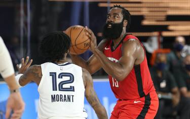 Orlando, FL - JULY 26: James Harden #13 of the Houston Rockets shoots three point basket against the Memphis Grizzlies during a scrimmage on July 26, 2020 at HP Field House at ESPN Wide World of Sports in Orlando, Florida. NOTE TO USER: User expressly acknowledges and agrees that, by downloading and/or using this Photograph, user is consenting to the terms and conditions of the Getty Images License Agreement. Mandatory Copyright Notice: Copyright 2020 NBAE (Photo by Joe Murphy/NBAE via Getty Images)