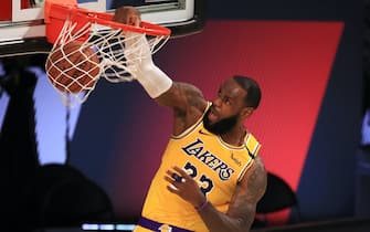LAKE BUENA VISTA, FLORIDA - JULY 30: LeBron James #23 of the Los Angeles Lakers dunks the ball against the LA Clippers during the second quarter of the game at The Arena at ESPN Wide World Of Sports Complex on July 30, 2020 in Lake Buena Vista, Florida. NOTE TO USER: User expressly acknowledges and agrees that, by downloading and or using this photograph, User is consenting to the terms and conditions of the Getty Images License Agreement. (Photo by Mike Ehrmann/Getty Images)