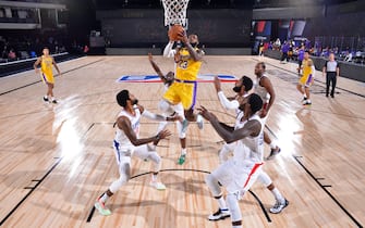 Orlando, FL - JULY 30: LeBron James #23 of the Los Angeles Lakers shoots the ball to take the lead against the LA Clippers on July 30, 2020 at The Arena at ESPN Wide World Of Sports Complex in Orlando, Florida. NOTE TO USER: User expressly acknowledges and agrees that, by downloading and/or using this Photograph, user is consenting to the terms and conditions of the Getty Images License Agreement. Mandatory Copyright Notice: Copyright 2020 NBAE (Photo by Jesse D. Garrabrant/NBAE via Getty Images)