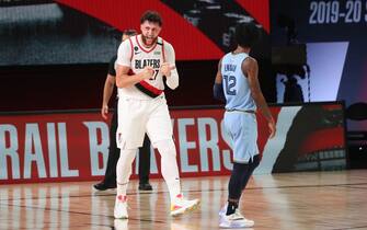 Orlando, FL - JULY 31: Jusuf Nurkic #27 of the Portland Trail Blazers celebrates during the game against the Memphis Grizzlies on July 31, 2020 at The Arena at ESPN Wide World of Sports in Orlando, Florida. NOTE TO USER: User expressly acknowledges and agrees that, by downloading and/or using this Photograph, user is consenting to the terms and conditions of the Getty Images License Agreement. Mandatory Copyright Notice: Copyright 2020 NBAE (Photo by Joe Murphy/NBAE via Getty Images)