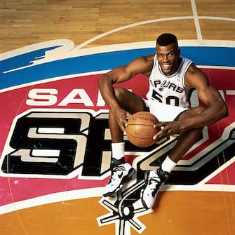 SAN ANTONIO - 1996:  David Robinson #50 of the San Antonio Spurs poses for a portrait at the Alamodome during the 1996 season in San Antonio, Texas.  NOTE TO USER: User expressly acknowledges and agrees that, by downloading and/or using this Photograph, User is consenting to the terms and conditions of the Getty Images License Agreement  Mandatory Copyright Notice:  Copyright 1996 NBAE  (Photo by Nathaniel S. Butler/NBAE via Getty Images)