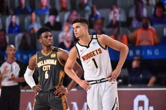 Orlando, FL - AUGUST 3: Michael Porter Jr. #1 of the Denver Nuggets and Hamidou Diallo #6 look on during a game against the Oklahoma City Thunder on August 3, 2020 at The Arena at ESPN Wide World Of Sports Complex in Orlando, Florida. NOTE TO USER: User expressly acknowledges and agrees that, by downloading and/or using this Photograph, user is consenting to the terms and conditions of the Getty Images License Agreement. Mandatory Copyright Notice: Copyright 2020 NBAE (Photo by David Dow/NBAE via Getty Images)
