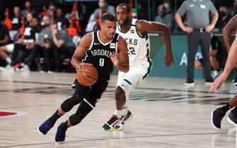 Orlando, FL - AUGUST 4: Timothe Luwawu-Cabarrot #9 of the Brooklyn Nets handles the ball during the game against the Milwaukee Bucks on August 4, 2020 at The Visa Athletic Center at ESPN Wide World Of Sports Complex in Reunion, Florida. NOTE TO USER: User expressly acknowledges and agrees that, by downloading and/or using this Photograph, user is consenting to the terms and conditions of the Getty Images License Agreement. Mandatory Copyright Notice: Copyright 2020 NBAE (Photo by Joe Murphy/NBAE via Getty Images)