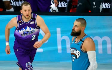 LAKE BUENA VISTA, FLORIDA - AUGUST 05: Joe Ingles #2 of the Utah Jazz reacts after scoring a three-pointer against the Memphis Grizzlies during the second half at HP Field House at ESPN Wide World Of Sports Complex on August 5, 2020 in Lake Buena Vista, Florida. NOTE TO USER: User expressly acknowledges and agrees that, by downloading and or using this photograph, User is consenting to the terms and conditions of the Getty Images License Agreement. (Photo by Kevin C. Cox/Getty Images)