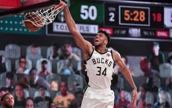 Orlando, FL - AUGUST 4: Giannis Antetokounmpo #34 of the Milwaukee Bucks dunks the ball against the Brooklyn Nets August 4, 2020 at HP Field House at ESPN Wide World of Sports in Orlando, Florida. NOTE TO USER: User expressly acknowledges and agrees that, by downloading and/or using this Photograph, user is consenting to the terms and conditions of the Getty Images License Agreement. Mandatory Copyright Notice: Copyright 2020 NBAE (Photo by David Dow/NBAE via Getty Images)