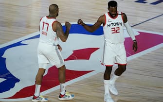 LAKE BUENA VISTA, FLORIDA - AUGUST 09:  Jeff Green #32 and P.J. Tucker #17 of the Houston Rockets celebrate after a play against the Sacramento Kings during the second half at HP Field House at ESPN Wide World Of Sports Complex on August 9, 2020 in Lake Buena Vista, Florida. NOTE TO USER: User expressly acknowledges and agrees that, by downloading and or using this photograph, User is consenting to the terms and conditions of the Getty Images License Agreement. (Photo by Ashley Landis-Pool/Getty Images)