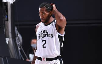 Orlando, FL - AUGUST 9: Kawhi Leonard #2 of the LA Clippers looks on during the game against the Brooklyn Nets on AUGUST 9, 2020 at AdventHealth Arena in Orlando, Florida. NOTE TO USER: User expressly acknowledges and agrees that, by downloading and/or using this Photograph, user is consenting to the terms and conditions of the Getty Images License Agreement. Mandatory Copyright Notice: Copyright 2020 NBAE (Photo by Garrett Ellwood/NBAE via Getty Images)
