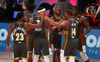 LAKE BUENA VISTA, FLORIDA - AUGUST 09: Terrance Ferguson #23, Darius Bazley #7, Chris Paul #3, Devon Hall #14, and Luguentz Dort #5 of the Oklahoma City Thunder celebrate after defeating the Washington Wizards at AdventHealth Arena at ESPN Wide World Of Sports Complex on August 9, 2020 in Lake Buena Vista, Florida. NOTE TO USER: User expressly acknowledges and agrees that, by downloading and or using this photograph, User is consenting to the terms and conditions of the Getty Images License Agreement. (Photo by Kim Klement - Pool/Getty Images)