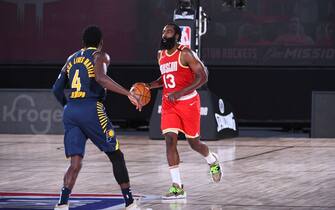 Orlando, FL - AUGUST 12: James Harden #13 of the Houston Rockets handles the ball during the game against the Indiana Pacers on August 12, 2020 at The AdventHealth Arena at ESPN Wide World Of Sports Complex in Orlando, Florida. NOTE TO USER: User expressly acknowledges and agrees that, by downloading and/or using this Photograph, user is consenting to the terms and conditions of the Getty Images License Agreement. Mandatory Copyright Notice: Copyright 2020 NBAE (Photo by Garrett Ellwood/NBAE via Getty Images)