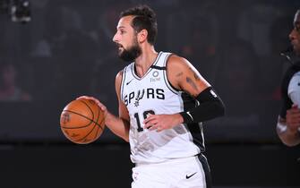 Orlando, FL - AUGUST 13: Marco Belinelli #18 of the San Antonio Spurs handles the ball against the Utah Jazz on August 13, 2020 at The Field House at ESPN Wide World Of Sports Complex at in Orlando, Florida. NOTE TO USER: User expressly acknowledges and agrees that, by downloading and/or using this Photograph, user is consenting to the terms and conditions of the Getty Images License Agreement. Mandatory Copyright Notice: Copyright 2020 NBAE (Photo by Garrett Ellwood/NBAE via Getty Images)