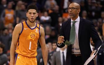 PHOENIX, ARIZONA - JANUARY 10: Head coach Monty Williams of the Phoenix Suns talks with Devin Booker #1 during the second half of the NBA game against the Orlando Magic at Talking Stick Resort Arena on January 10, 2020 in Phoenix, Arizona. The Suns defeated the Magic 98-94. NOTE TO USER: User expressly acknowledges and agrees that, by downloading and or using this photograph, user is consenting to the terms and conditions of the Getty Images License Agreement. (Photo by Christian Petersen/Getty Images)