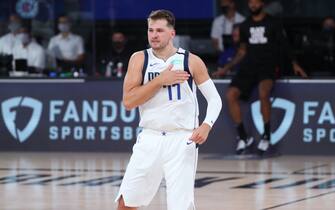 ORLANDO, FL - AUGUST 19: Luka Doncic #77 of the Dallas Mavericks reacts to play during Round One, Game Two of the NBA Playoffs on August 19, 2020 at AdventHealth Arena in Orlando, Florida. NOTE TO USER: User expressly acknowledges and agrees that, by downloading and/or using this Photograph, user is consenting to the terms and conditions of the Getty Images License Agreement. Mandatory Copyright Notice: Copyright 2020 NBAE (Photo by Joe Murphy/NBAE via Getty Images)