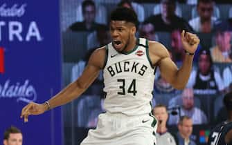 Orlando, FL - AUGUST 24: Giannis Antetokounmpo #34 of the Milwaukee Bucks celebrates during the game against the Orlando Magic during Round One, Game Four of the NBA Playoffs on August 24, 2020 in Orlando, Florida at The Field House. NOTE TO USER: User expressly acknowledges and agrees that, by downloading and/or using this Photograph, user is consenting to the terms and conditions of the Getty Images License Agreement. Mandatory Copyright Notice: Copyright 2020 NBAE (Photo by Joe Murphy/NBAE via Getty Images)