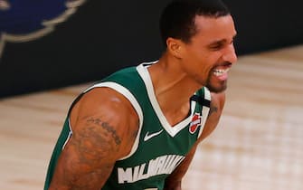 LAKE BUENA VISTA, FLORIDA - AUGUST 08: George Hill #3 of the Milwaukee Bucks reacts to a misses steal against the Dallas Mavericks at The Arena at ESPN Wide World Of Sports Complex on August 08, 2020 in Lake Buena Vista, Florida. NOTE TO USER: User expressly acknowledges and agrees that, by downloading and or using this photograph, User is consenting to the terms and conditions of the Getty Images License Agreement. (Photo by Kevin C. Cox/Getty Images)