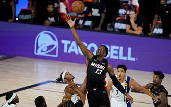 LAKE BUENA VISTA, FLORIDA - AUGUST 24: Bam Adebayo #13 of the Miami Heat grabs the ball over the Indiana Pacers during the second half of a first round playoff game at The Field House at ESPN Wide World Of Sports Complex on August 24, 2020 in Lake Buena Vista, Florida. NOTE TO USER: User expressly acknowledges and agrees that, by downloading and or using this photograph, User is consenting to the terms and conditions of the Getty Images License Agreement. (Photo by Ashley Landis-Pool/Getty Images)