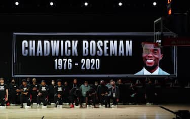 ORLANDO, FL - AUGUST 29: A moment of silence taken for Chadwick Boseman prior to a game between the Portland Trail Blazers and the Los Angeles Lakers during Round One, Game Five of the NBA Playoffs on August 29, 2020 at the AdventHealth Arena at ESPN Wide World Of Sports Complex in Orlando, Florida. NOTE TO USER: User expressly acknowledges and agrees that, by downloading and/or using this Photograph, user is consenting to the terms and conditions of the Getty Images License Agreement. Mandatory Copyright Notice: Copyright 2020 NBAE (Photo by Jesse D. Garrabrant/NBAE via Getty Images)