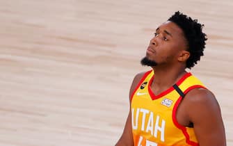 LAKE BUENA VISTA, FLORIDA - AUGUST 30: Donovan Mitchell #45 of the Utah Jazz reacts against the Denver Nuggets during the fourth quarter in Game Six of the Western Conference First Round during the 2020 NBA Playoffs at AdventHealth Arena at ESPN Wide World Of Sports Complex on August 30, 2020 in Lake Buena Vista, Florida. NOTE TO USER: User expressly acknowledges and agrees that, by downloading and or using this photograph, User is consenting to the terms and conditions of the Getty Images License Agreement. (Photo by Kevin C. Cox/Getty Images)