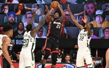 ORLANDO, FL - AUGUST 31: Jimmy Butler #22 of the Miami Heat shoots the ball against the Milwaukee Bucks during Game One of the Eastern Conference Semifinals of the NBA Playoffs on August 31, 2020 at the The Field House at ESPN Wide World Of Sports Complex in Orlando, Florida. NOTE TO USER: User expressly acknowledges and agrees that, by downloading and/or using this Photograph, user is consenting to the terms and conditions of the Getty Images License Agreement. Mandatory Copyright Notice: Copyright 2020 NBAE (Photo by Garrett Ellwood/NBAE via Getty Images)