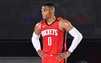 Orlando, FL - AUGUST 31: Russell Westbrook #0 of the Houston Rockets looks on during the game against the Oklahoma City Thunder during Round One, Game Six of the NBA Playoffs on August 31, 2020 in Orlando, Florida at AdventHealth Arena. NOTE TO USER: User expressly acknowledges and agrees that, by downloading and/or using this Photograph, user is consenting to the terms and conditions of the Getty Images License Agreement. Mandatory Copyright Notice: Copyright 2020 NBAE (Photo by Andrew D. Bernstein/NBAE via Getty Images)