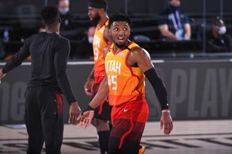 Orlando, FL - AUGUST 23: Donovan Mitchell #45 of the Utah Jazz yells and celebrates during Round One Game Four of the NBA Playoffs against the Denver Nuggets on August 23, 2020 at The AdventHealth Arena at ESPN Wide World Of Sports Complex in Orlando, Florida. NOTE TO USER: User expressly acknowledges and agrees that, by downloading and/or using this Photograph, user is consenting to the terms and conditions of the Getty Images License Agreement. Mandatory Copyright Notice: Copyright 2020 NBAE (Photo by Garrett Ellwood/NBAE via Getty Images)