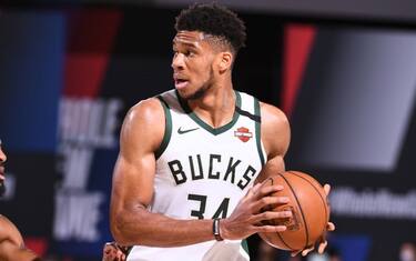 ORLANDO, FL - SEPTEMBER 4: Giannis Antetokounmpo #34 of the Milwaukee Bucks handles the ball against the Miami Heat during Game Three of the Eastern Conference Semifinals of the NBA Playoffs on September 4, 2020 at the The Field House at ESPN Wide World Of Sports Complex in Orlando, Florida. NOTE TO USER: User expressly acknowledges and agrees that, by downloading and/or using this Photograph, user is consenting to the terms and conditions of the Getty Images License Agreement. Mandatory Copyright Notice: Copyright 2020 NBAE (Photo by Garrett Ellwood/NBAE via Getty Images)