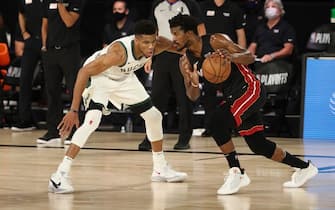 Orlando, FL - SEPTEMBER 4: Giannis Antetokounmpo #34 of the Milwaukee Bucks plays defense against Jimmy Butler #22 of the Miami Heat during Game Three of the Eastern Conference Semifinals on September 4, 2020 in Orlando, Florida at The Field House. NOTE TO USER: User expressly acknowledges and agrees that, by downloading and/or using this Photograph, user is consenting to the terms and conditions of the Getty Images License Agreement. Mandatory Copyright Notice: Copyright 2020 NBAE (Photo by Nathaniel S. Butler/NBAE via Getty Images)