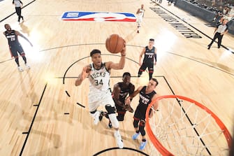 ORLANDO, FL - SEPTEMBER 4: Giannis Antetokounmpo #34 of the Milwaukee Bucks drives to the basket against the Miami Heat during Game Three of the Eastern Conference Semifinals of the NBA Playoffs on September 4, 2020 at the The Field House at ESPN Wide World Of Sports Complex in Orlando, Florida. NOTE TO USER: User expressly acknowledges and agrees that, by downloading and/or using this Photograph, user is consenting to the terms and conditions of the Getty Images License Agreement. Mandatory Copyright Notice: Copyright 2020 NBAE (Photo by Garrett Ellwood/NBAE via Getty Images)
