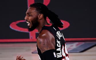 LAKE BUENA VISTA, FLORIDA - SEPTEMBER 06: Jae Crowder #99 of the Miami Heat reacts after a three point basket during the third quarter against the Milwaukee Bucks in Game Four of the Eastern Conference Second Round during the 2020 NBA Playoffs at AdventHealth Arena at the ESPN Wide World Of Sports Complex on September 06, 2020 in Lake Buena Vista, Florida. NOTE TO USER: User expressly acknowledges and agrees that, by downloading and or using this photograph, User is consenting to the terms and conditions of the Getty Images License Agreement. (Photo by Douglas P. DeFelice/Getty Images)
