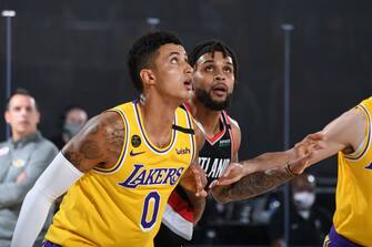 ORLANDO, FL - AUGUST 29: Kyle Kuzma #0 of the Los Angeles Lakers and Gary Trent Jr. #2 of the Portland Trail Blazers fights for position to grab the rebound during Round One, Game Five of the NBA Playoffs on August 29, 2020 at AdventHealth Arena in Orlando, Florida. NOTE TO USER: User expressly acknowledges and agrees that, by downloading and/or using this Photograph, user is consenting to the terms and conditions of the Getty Images License Agreement. Mandatory Copyright Notice: Copyright 2020 NBAE (Photo by Andrew D. Bernstein/NBAE via Getty Images)