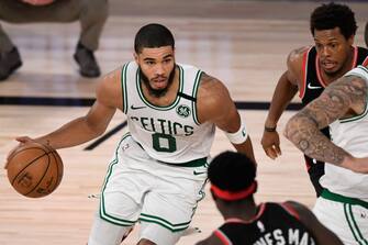 LAKE BUENA VISTA, FLORIDA - SEPTEMBER 05: Jayson Tatum #0 of the Boston Celtics dribbles the ball during the third quarter in Game Four of the Eastern Conference Second Round during the 2020 NBA Playoffs at the Field House at the ESPN Wide World Of Sports Complex on September 05, 2020 in Lake Buena Vista, Florida. NOTE TO USER: User expressly acknowledges and agrees that, by downloading and or using this photograph, User is consenting to the terms and conditions of the Getty Images License Agreement. (Photo by Douglas P. DeFelice/Getty Images)