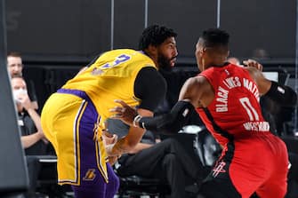 ORLANDO, FL - SEPTEMBER 10: Anthony Davis #3 of the Los Angeles Lakers handles the ball while Russell Westbrook #0 of the Houston Rockets plays defense during Game Four of the Western Conference Semifinals of the NBA Playoffs on September 10, 2020 at The AdventHealth Arena at ESPN Wide World Of Sports Complex in Orlando, Florida. NOTE TO USER: User expressly acknowledges and agrees that, by downloading and/or using this Photograph, user is consenting to the terms and conditions of the Getty Images License Agreement. Mandatory Copyright Notice: Copyright 2020 NBAE (Photo by Andrew D. Bernstein/NBAE via Getty Images)