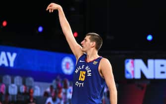 ORLANDO, FL - SEPTEMBER 11: Nikola Jokic #15 of the Denver Nuggets celebrates a three point basket against the LA Clippers during Game Five of the Western Conference Semifinals of the NBA Playoffs on September 11, 2020 in Orlando, Florida at The Field House. NOTE TO USER: User expressly acknowledges and agrees that, by downloading and/or using this photograph, user is consenting to the terms and conditions of the Getty Images License Agreement.  Mandatory Copyright Notice: Copyright 2020 NBAE (Photo by Garrett Ellwood/NBAE via Getty Images)