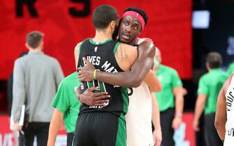 ORLANDO, FL - SEPTEMBER 11: Jayson Tatum #0 of the Boston Celtics and Pascal Siakam #43 of the Toronto Raptors hug after Game Seven of the Eastern Conference Semifinals of the NBA Playoffs on September 11, 2020 at The AdventHealth Arena at ESPN Wide World Of Sports Complex in Orlando, Florida. NOTE TO USER: User expressly acknowledges and agrees that, by downloading and/or using this Photograph, user is consenting to the terms and conditions of the Getty Images License Agreement. Mandatory Copyright Notice: Copyright 2020 NBAE (Photo by Nathaniel S. Butler/NBAE via Getty Images)