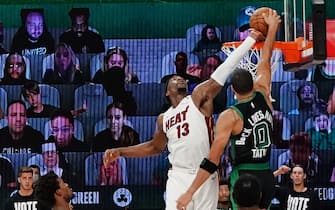 ORLANDO, FL - SEPTEMBER 15: Bam Adebayo #13 of the Miami Heat blocks a dunk attempt in the game against Jayson Tatum #0 of the Boston Celtics during Game One of the Eastern Conference Finals of the NBA Playoffs on September 15, 2020 at The Field House at ESPN Wide World Of Sports Complex in Orlando, Florida. NOTE TO USER: User expressly acknowledges and agrees that, by downloading and/or using this Photograph, user is consenting to the terms and conditions of the Getty Images License Agreement. Mandatory Copyright Notice: Copyright 2020 NBAE (Photo by Jesse D. Garrabrant/NBAE via Getty Images)